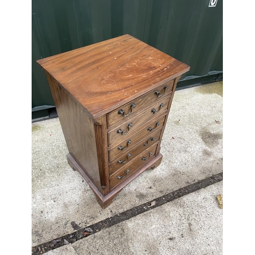 345 - A small reproduction mahogany chest of five drawers