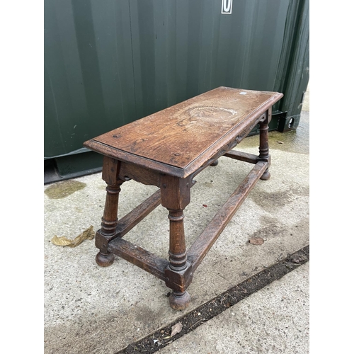 346 - A carved oak occasional table 90x32x 45