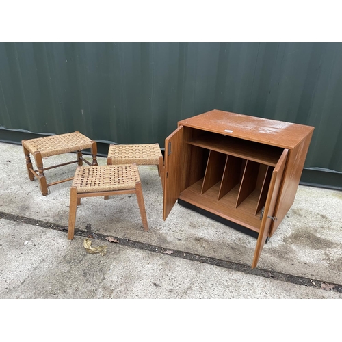 350 - Teak record cabinet and three rush seat stools