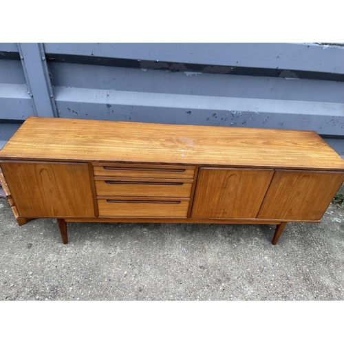 354 - A mid century teak cocktail sideboard by Alfred Cox