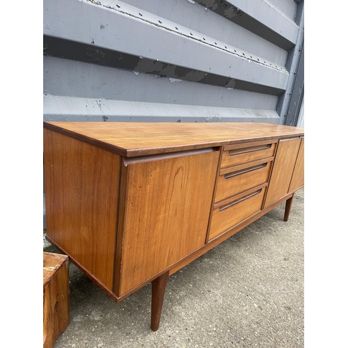 354 - A mid century teak cocktail sideboard by Alfred Cox