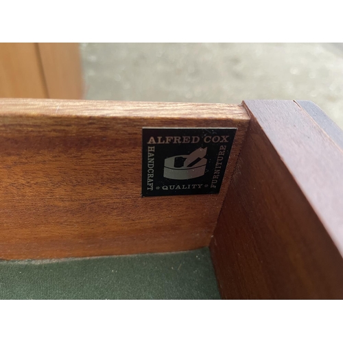 354 - A mid century teak cocktail sideboard by Alfred Cox