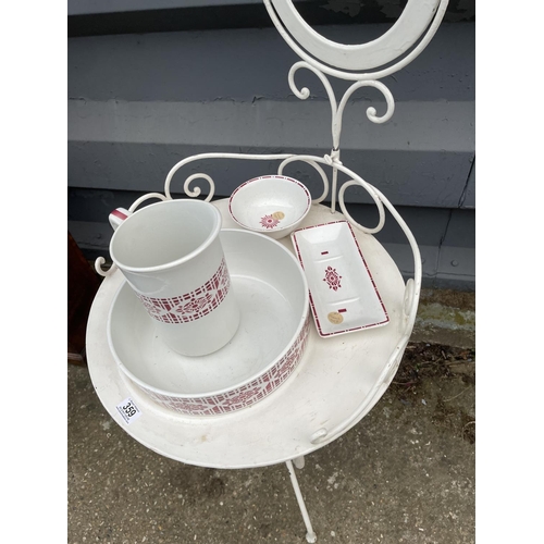 359 - A continental metal framed washstand with jug and bowl set. (mirror lacking glass)