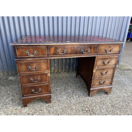 52 - A reproduction twin pedestal desk