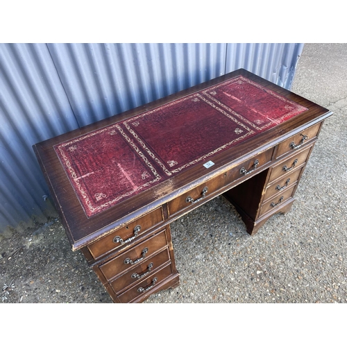 52 - A reproduction twin pedestal desk