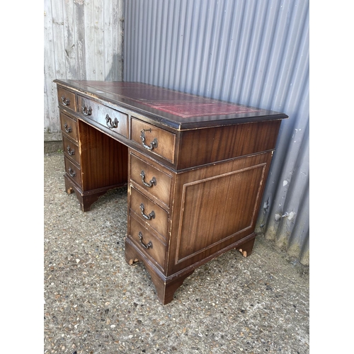 52 - A reproduction twin pedestal desk