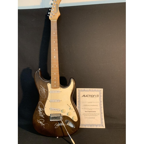 575 - Signed Oasis electric guitar with certificate