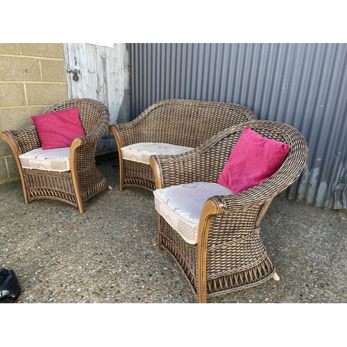 60 - A wicker three piece conservatory suite