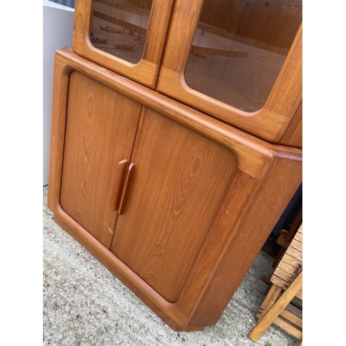 77 - A skoby style teak corner cabinet