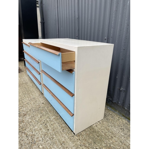 78 - Two retro blue and white painted ply chests of drawers