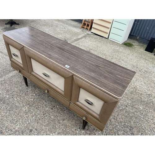 80 - A retro cushion front sideboard with formica top 152x 43x80