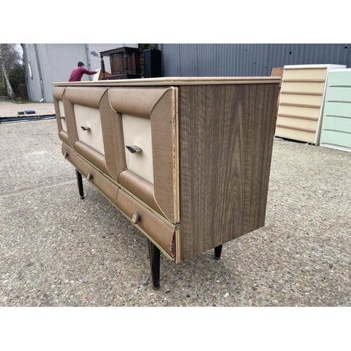 80 - A retro cushion front sideboard with formica top 152x 43x80