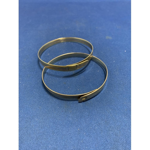 832 - Two two-tone 9ct Gold bangles, both marked 9kt and Hallmarked, total weight 19.3 gms