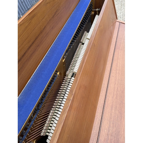 94 - A teak cased Zender piano and stool