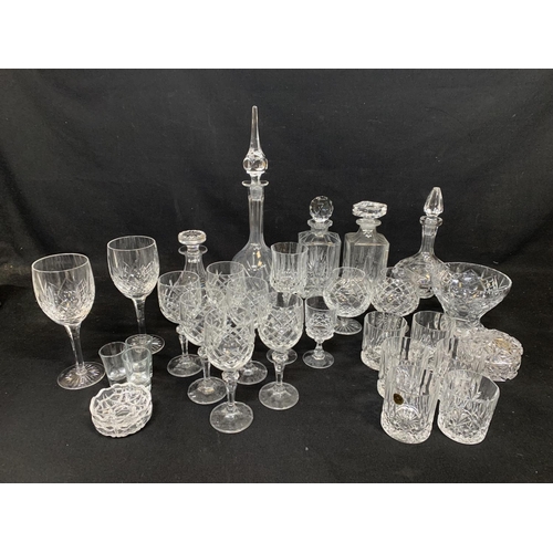 1018 - Five Cut glass Decanters, two Edinburgh crystal wine glasses and other glasses (2)