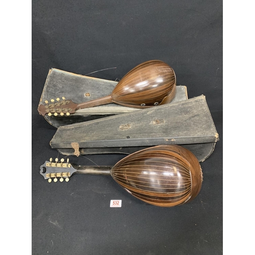 532 - 2 cased mandolins