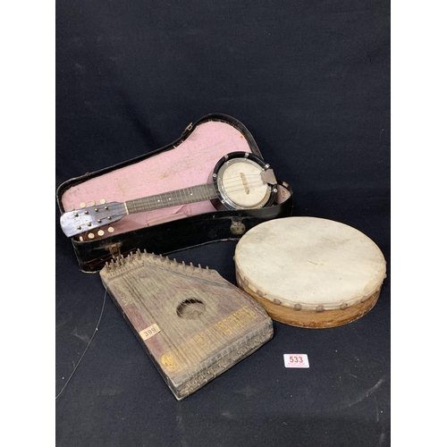 533 - Cased Banjo, zither and tambourine