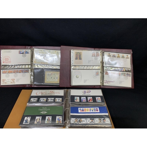 690 - 2 Albums of Royal Mail first day Covers and an album of Mint stamps