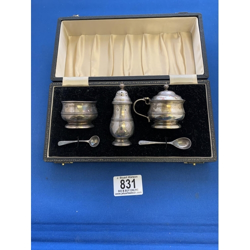 831 - Cased Hallmarked Silver three piece cruet Set with blue glass liners, net weight 3.2 ozt