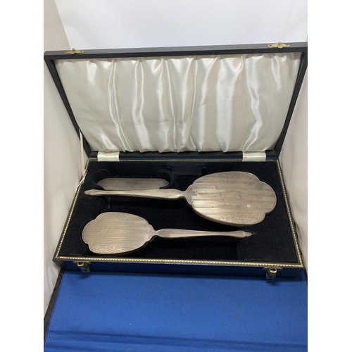 844 - Cased Sterling Silver three piece Dressing Table Set (brushes a/f)