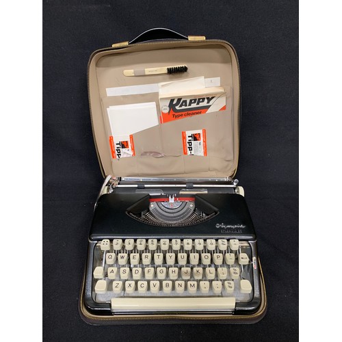 681 - Cased Olympia Splendid 99 portable typewriter