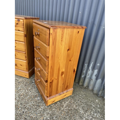 17 - A pair of ducal pine tallboy chests of five drawers