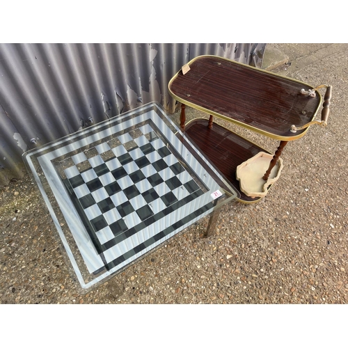 21 - A chrome coffee table and a retro trolley