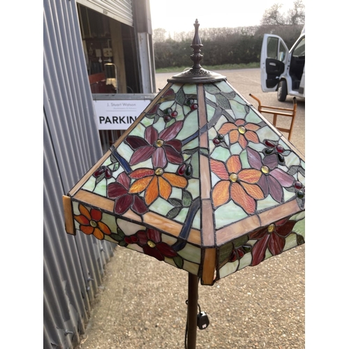 30 - A floor standing Tiffany style standard lamp