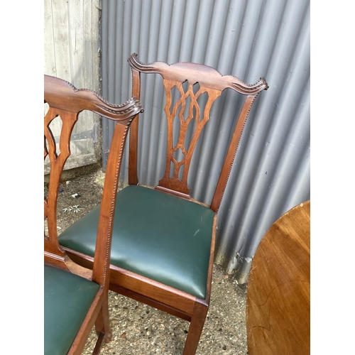 31 - A Pair of mahogany dining chairs together with a victorian snap top occasional table