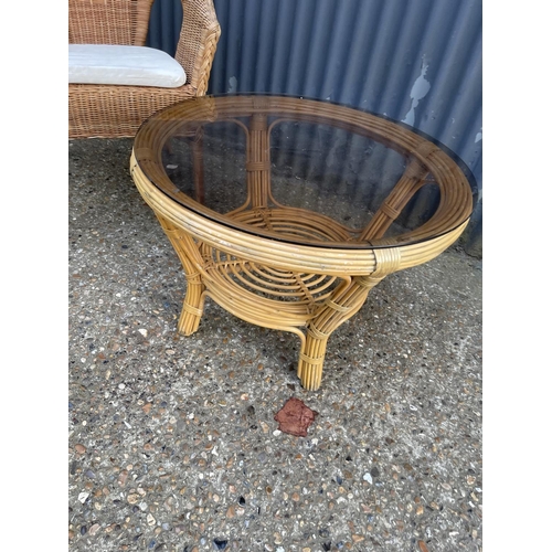 38 - Whicker chair together with wicker smoked glass  table