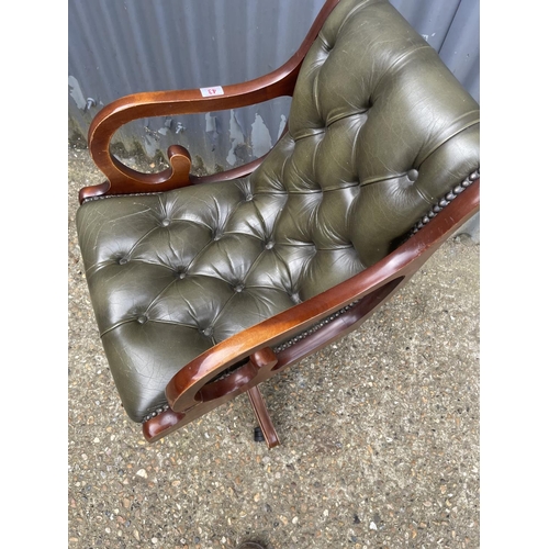 43 - A green leather chesterfield office chair