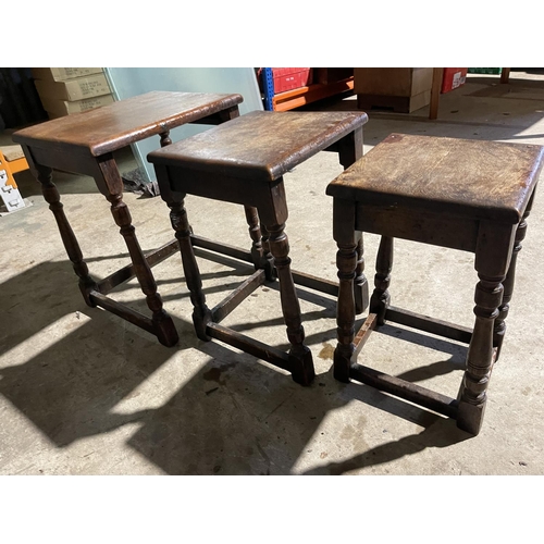 65 - An antique oak nest of three tables 36x45 x56