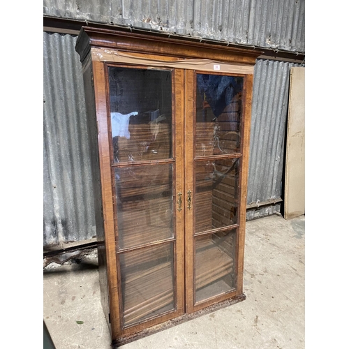 69 - A Georgian glazed cabinet for restoration