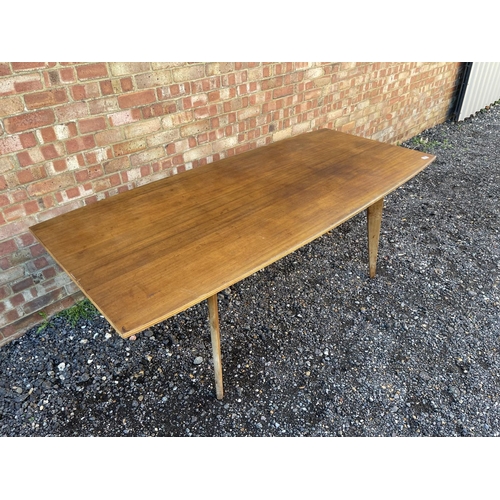 10 - A mid century teak plank top dining table possibly by Alfred Cox 199x94x74