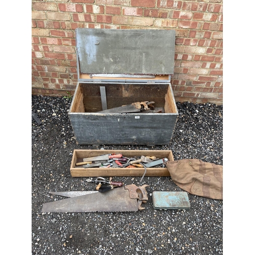 100 - An antique carpenters chest with assorted vintage tools inside