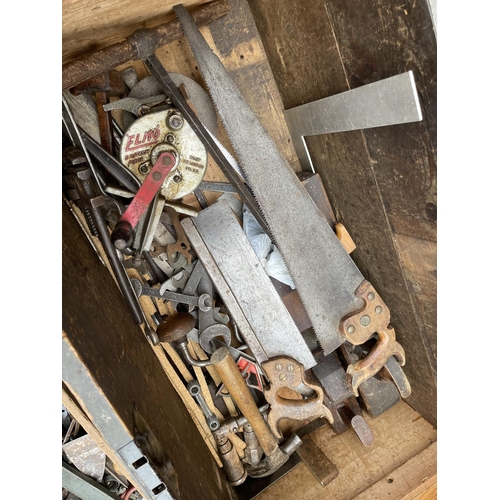 100 - An antique carpenters chest with assorted vintage tools inside