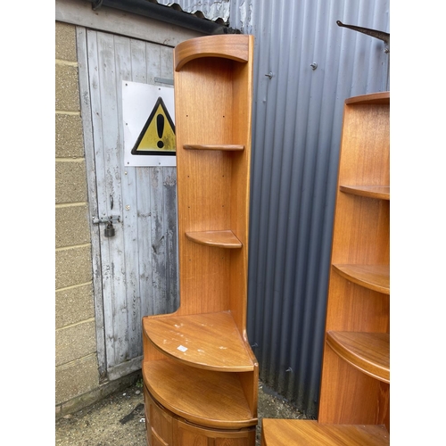 107 - Two mid century teak corner bookcase units