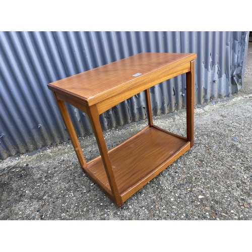 111 - A mid century teak fold over tea trolley