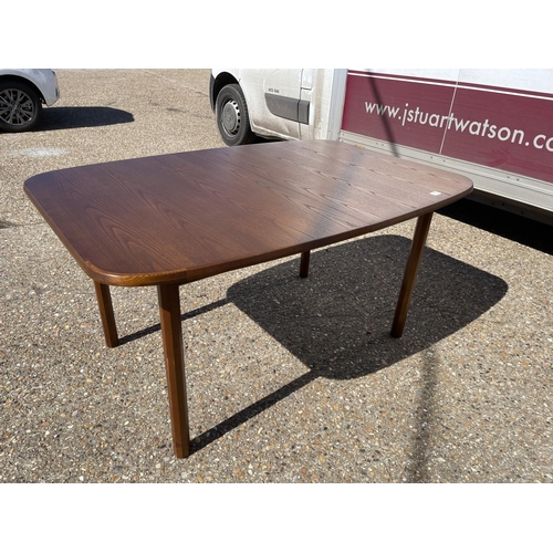 115 - A mid century g plan teak extending dining table