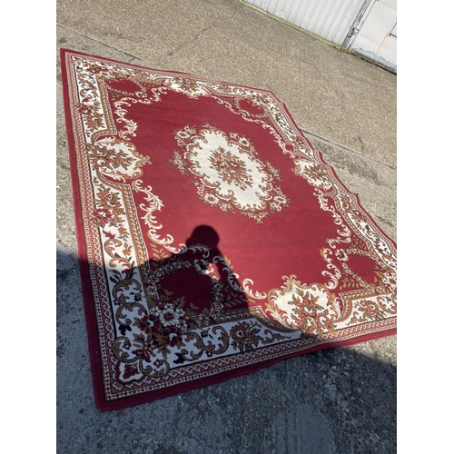 122 - A large red pattern rug 320x245