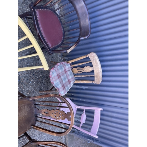 127 - A painted ercol chair, two wheel backs, pink chair and two others