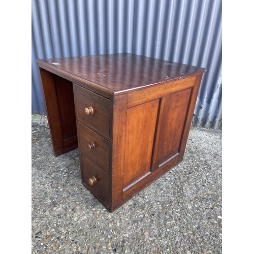 137 - An unusual mahogany childs three drawer desk 68x 68x66