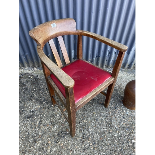 140 - An arts and crafts style oak desk chair together with a stone ware bottle