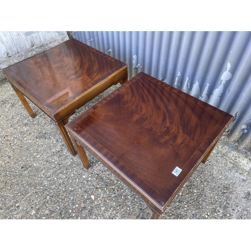 141 - A pair of reproduction mahogany lamp tables 62cm square