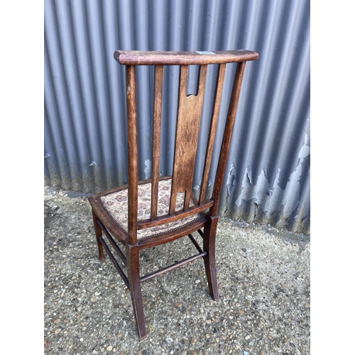 144 - A single art nouveau inlaid chair