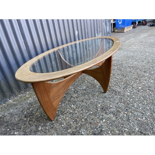 153 - A g plan teak oval coffee table with drop in glass top 125x65