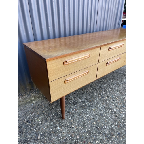 154 - A mid century teak chest of six drawers with optional mirror and haunches 150x44x70