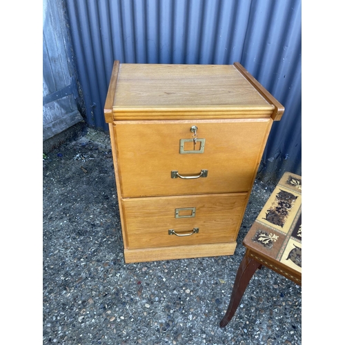 157 - A modern two drawer filing cabinet, Italian  musical table and a three drawer side table