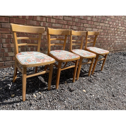 18 - A set of four vintage kitchen chairs