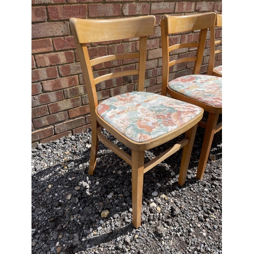 18 - A set of four vintage kitchen chairs